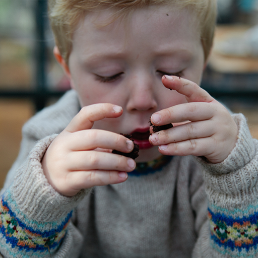 At what age can children safely eat popcorn?